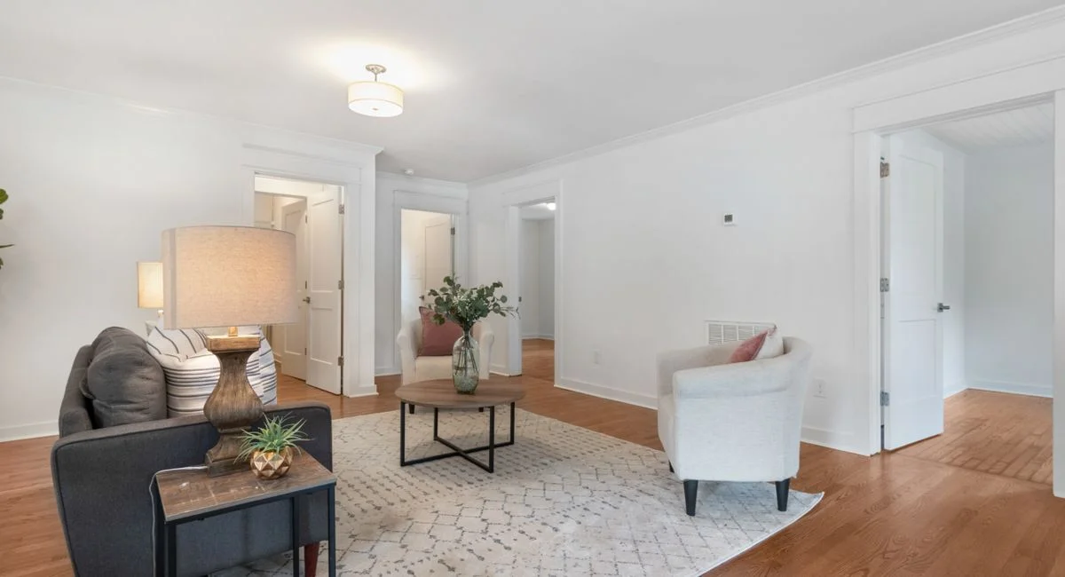 A beautifully designed living room showcasing minimalist elegance with modern furnishings.